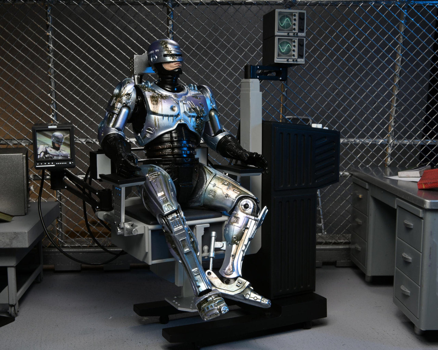 Robocop Battle Damaged Robocop with Chair Ultimate 7 Inch Scale Action Figure