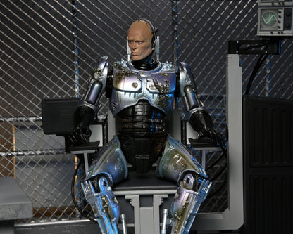 Robocop Battle Damaged Robocop with Chair Ultimate 7 Inch Scale Action Figure